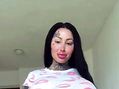 Gorgeous bimbo huge fake funbags tattooed