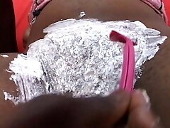 Nice tits black bitch sucking and fucking a black dong after coochie shaving