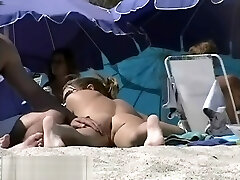 Appealing chicks caught on a hidden naturist beach