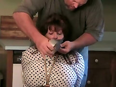 Elane bound in the kitchen (big blindfold). Elane bound in the kitchen (big blindfold).