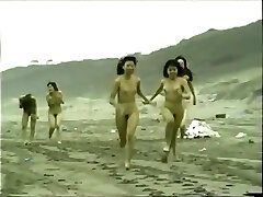 japanese bare girls running on the beach
