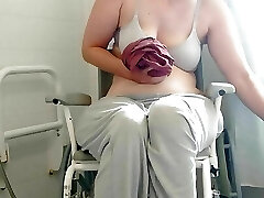 Paraplegic brunette Purplewheelz British cougar peeing in the shower
