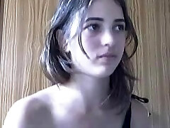 Young coquette with petite tits danced in front of the cam