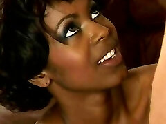 Ebony babe with delicious tits gets pussy pounded hard by juicy white dick