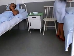 Sexi nurse with crimson highheels