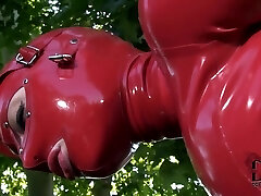 Latex Lucy in latex suit is fingering cunt