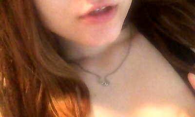 Redhead Asian masturbates her puss with fingers and cums