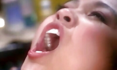 Chinese beauty wraps her lips around a massive white cock then gets drilled