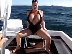 Busty Woman Getting Herself Off on a Boat
