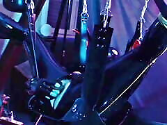 Rubberboy sex-toy-fuck and pissing in sling