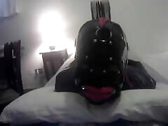 Laura is hogtied in lady pissy video catsuite and high heels, throated with a lip open mouth gag POV