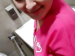 A young girl sucks a stranger&039;s cock and swallows sperm in exchange for coffee in a toilet in a shopping mall