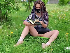 Masked bookworm Julia Meow teasing with her pussy in public