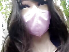 femalemask girl wear the silicone femaleskin outside the street