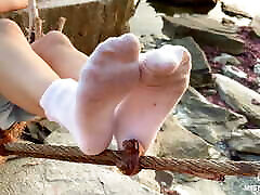 Goddess sonia glaze katna bbw in dirty white socks closeup against sea sunset