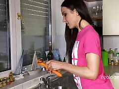Russian nataly gold rubs her hole with carrot in the kitchen