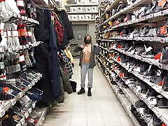 Topless woman trying clothes in jasmin sex pron store!