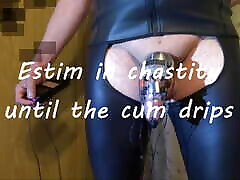 Estim in chastity until the cum drips