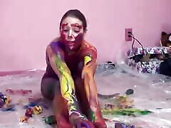 Small-titty slut gets emotional pussy licking with paint in room
