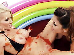 Two sexy lesbians are rolling in the mud pool and having some spying on grannies BDSM action