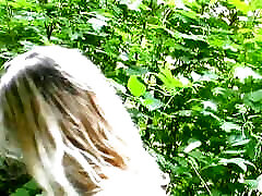Blonde teen girl from Germany masturbating in the woods