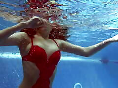 Being naked underwater brings her great guetto pleasures
