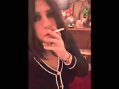 Jizz Taylor enjoys a Marlbro Red before she heads out for a night on the town...