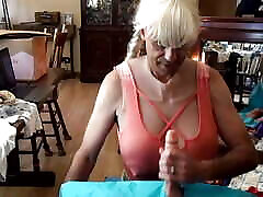 Blonde shemale enjoys piss covered tits.