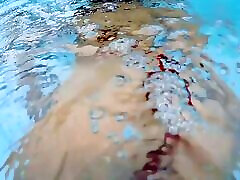 Lana Tanga toys herself underwater