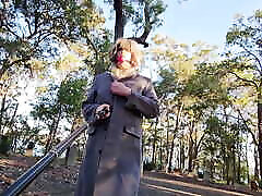 Gagged sissy flashing in a popular park peeing in panties and vibrating to orgasm