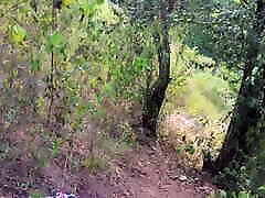 Latina teen gives a blowjob in the woods