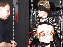 Mature German blonde dominated in BDSM scene Mature German blonde dominated in BDSM scene