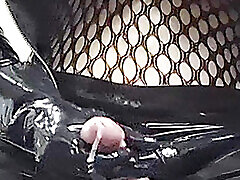 Alison in fishnet and black latex