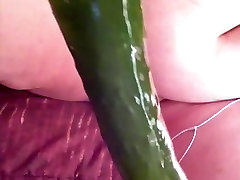 jeanine thai playing with cucomber in pussy