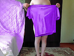 Lovely sissy holding pastel notebook with soft hands