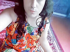 Sweet shemale posing in lace robe on soft bed