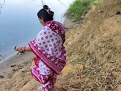 Indian bas pblik wife bathing in the river in outdoor area