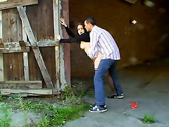 Big bottomed brunette nympho gets nailed missionary in the warehouse