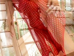 Stunning Japanese sweetie Mario Fujii puts on red fishnet teen sex trib in stocking pantyhose