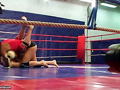 Sporty and busty brunette Lioness wrestles on the boxing ring