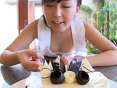 Breath taking Asian hottie Emi Ito eats a cake with great joy
