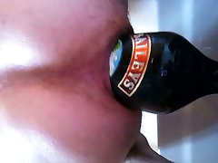 Close up of me anal fucking a large bottle.