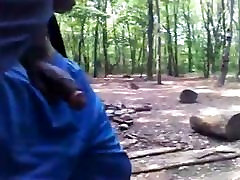 Black guy walks in woods with cock out