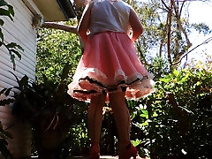 sissy gorgeous jewish girl roseanne outdoors in pink sissy dress