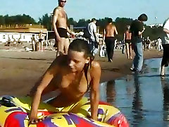 Spy nude girl picked up by voyeur cam at nude beach