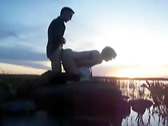 I ax vido girel my babe during sunset on the lake
