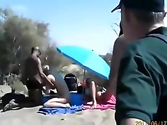Cuckold threesome at a teen confessions beach. spectators ? they dont give a shit !!!
