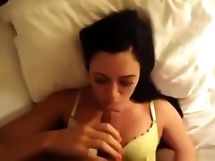 Dark haired girl sucks cock, gets doggystyle fucked ending with a facial.
