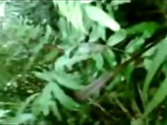 Asian busty mommy tube couple has sex in the jungle