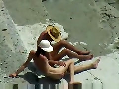 Voyeur tapes a skinny girl having a doggystyle quickie on a actors xxn beach